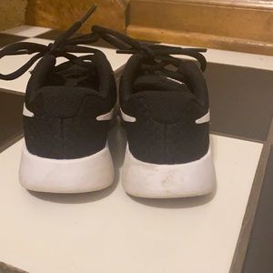 Black and white toddler Nike sneakers